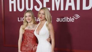 Amanda Seyfried^ Sydney Sweeney at the Premiere of The Housemaid at the TCL Chinese Theatre IMAX LOS ANGELES - DECEMBER 15 2025